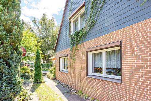 Seitenansicht  - Doppelhaushälfte in 15562 Rüdersdorf bei Berlin mit 98m² kaufen