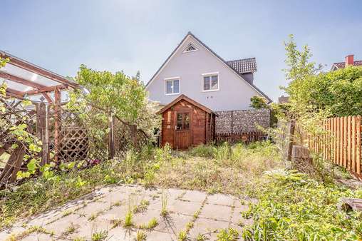 Gartenansicht Gartenansicht - Einfamilienhaus in 12683 Berlin mit 98m² kaufen
