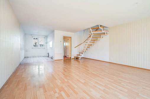 Wohnzimmeransicht im EG mit Küchenbereich Wohnzimmeransicht im EG mit Küchenbereich - Einfamilienhaus in 12683 Berlin mit 98m² kaufen