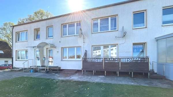 rückwärtige Gebäudeansicht - Reihenmittelhaus in 18233 Neubukow mit 72m² kaufen