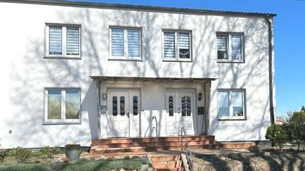 strassenseitige Gebäudeansicht - Reihenmittelhaus in 18233 Neubukow mit 72m² kaufen