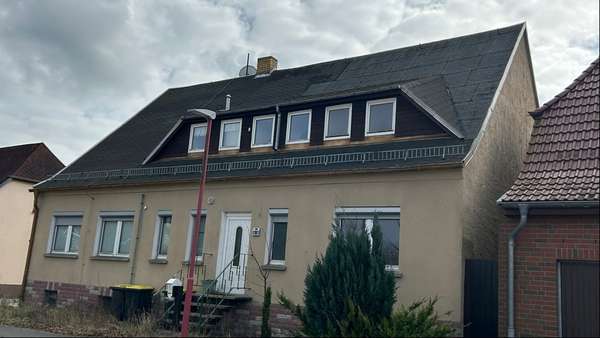 Ansicht Straßenseite - Zwangsversteigerung Einfamilienhaus in 18299 Dolgen am See mit 215m² kaufen