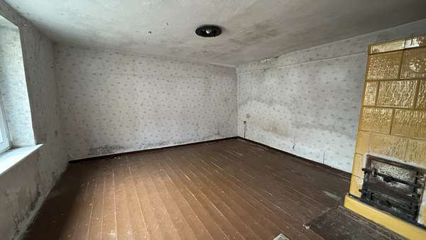 Zimmer mit Kachelofen - Reihenendhaus in 18465 Tribsees mit 49m² kaufen