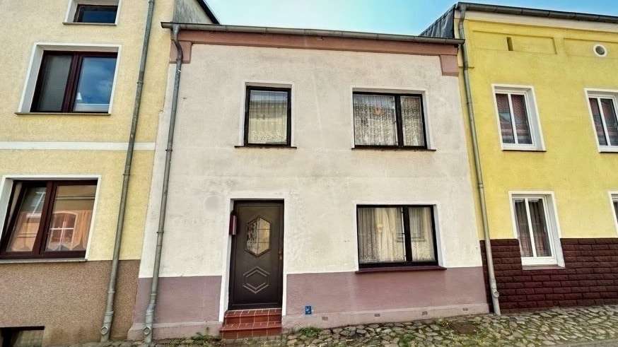 straßenseitige Gebäudeansicht - Einfamilienhaus in 18258 Schwaan mit 71m² kaufen