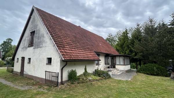 Ansicht mit Hauseingang - Einfamilienhaus in 18292 Kuchelmiß mit 79m² kaufen