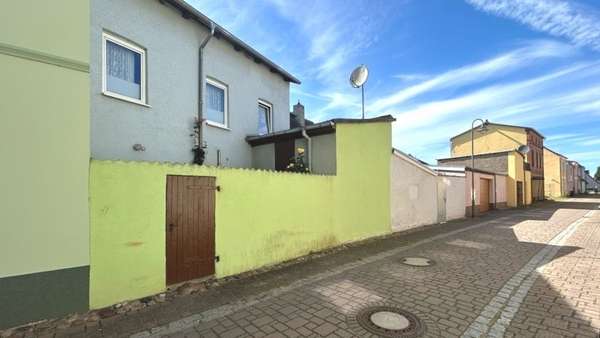 rückwärtige Gebäudeansicht - Einfamilienhaus in 18258 Schwaan mit 95m² kaufen