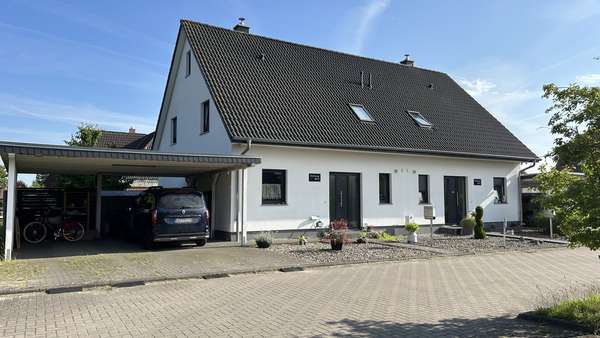 Außenansicht Außenansicht - Doppelhaushälfte in 18184 Thulendorf mit 117m² als Kapitalanlage kaufen