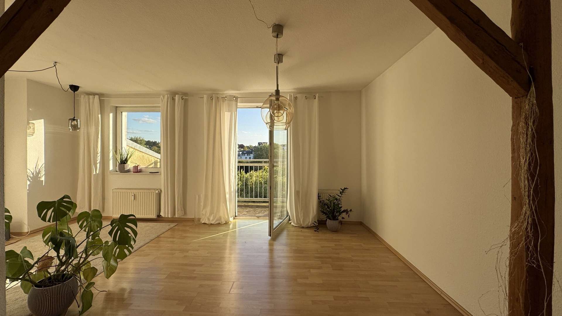 Wohnzimmer Wohnzimmer - Dachgeschosswohnung in 18057 Rostock mit 61m² kaufen