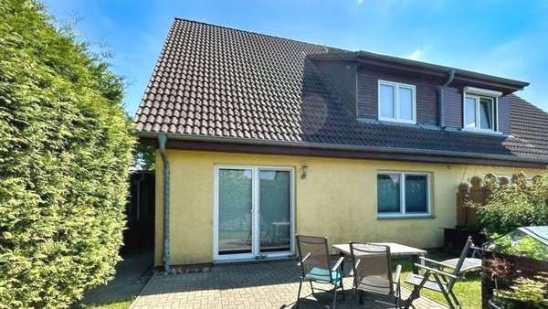 rückwärtige Gebäudeansicht rückwärtige Gebäudeansicht - Doppelhaushälfte in 18239 Satow mit 139m² kaufen