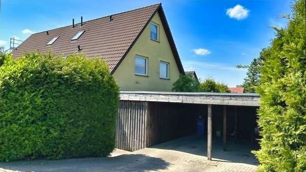 straßenseitige Gebäudeansicht straßenseitige Gebäudeansicht - Doppelhaushälfte in 18239 Satow mit 139m² kaufen