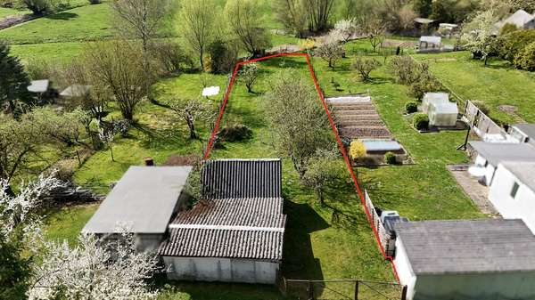 Grundstück (Straßenansicht) - Doppelhaushälfte in 18233 Carinerland mit 81m² kaufen