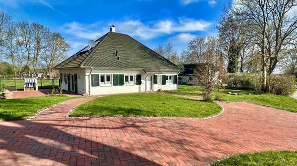 Hausansicht Hausansicht - Bungalow in 23946 Ostseebad Boltenhagen mit 120m² kaufen