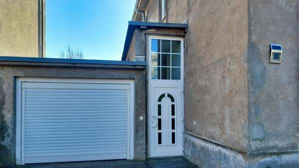 Eingang und vordere Garage - Mehrfamilienhaus in 23970 Wismar mit 290m² kaufen