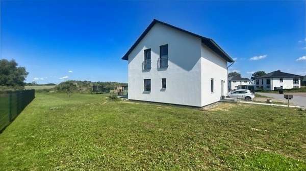 Nord-West Seite Nord-West Seite - Einfamilienhaus in 23972 Dorf Mecklenburg mit 143m² kaufen
