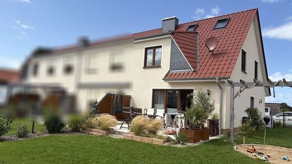 Ansicht von Süden - Reihenendhaus in 23972 Dorf Mecklenburg mit 106m² kaufen