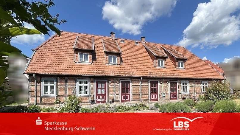 Gartenansicht Wohnhaus - Mehrfamilienhaus in 19306 Neustadt-Glewe mit 247m² kaufen