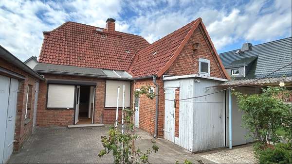 Rückansicht Rückansicht - Einfamilienhaus in 19288 Ludwigslust mit 97m² kaufen