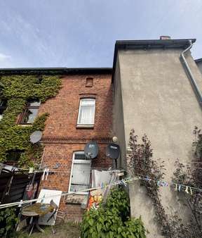 hintere Ansicht - Zweifamilienhaus in 19370 Parchim mit 112m² als Kapitalanlage kaufen