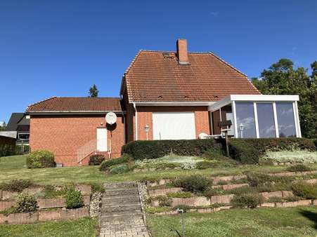 Rückseite mit Wintergarten Rückseite mit Wintergarten - Einfamilienhaus in 17109 Demmin mit 142m² kaufen