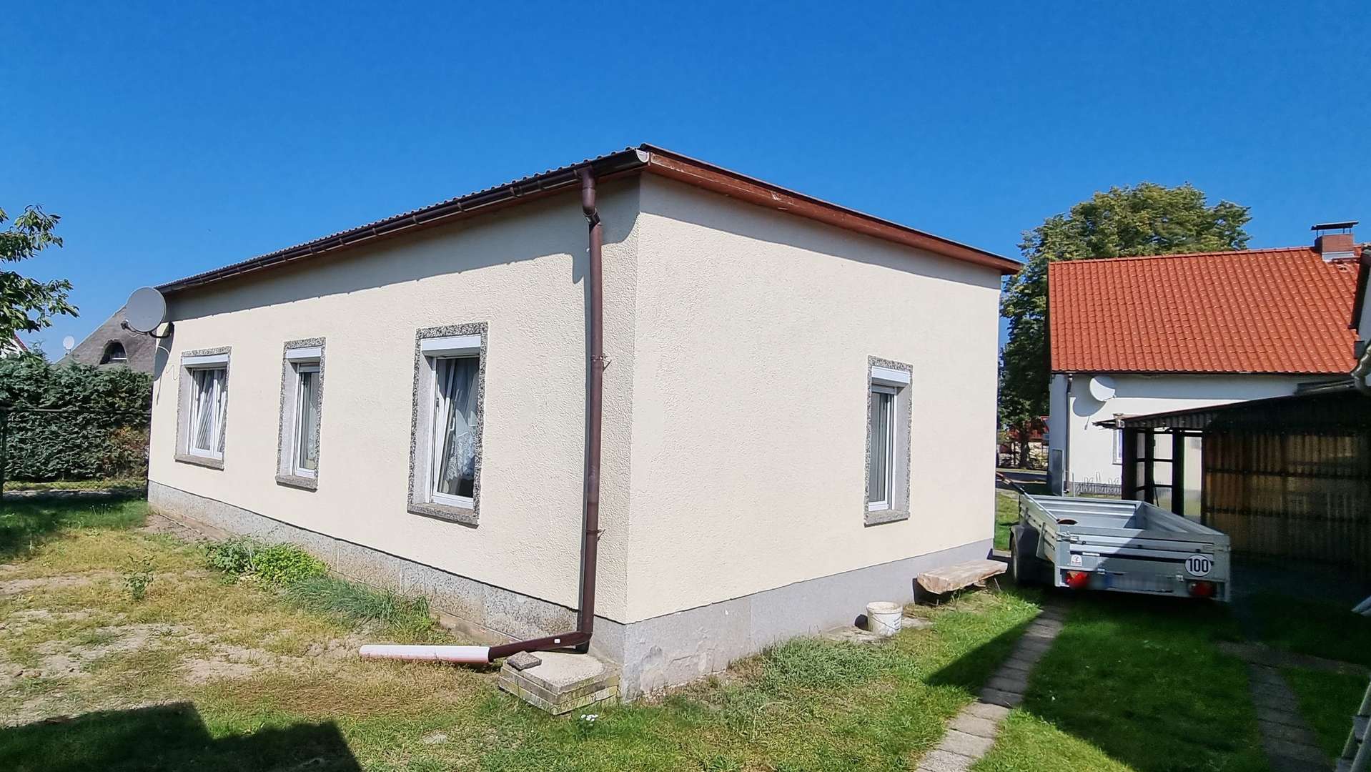 Rückseite des Bungalows Rückseite des Bungalows - Landhaus in 17375 Leopoldshagen mit 160m² kaufen