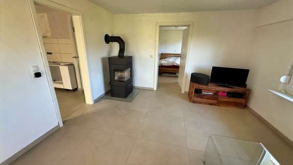 Wohnzimmer - Einfamilienhaus in 18516 Süderholz mit 132m² kaufen
