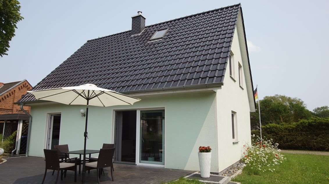 gartenseitige Ansicht - Einfamilienhaus in 18445 Klausdorf mit 104m² kaufen