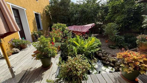 Garten mit Teich Garten mit Teich - Stadthaus in 18465 Tribsees mit 203m² kaufen