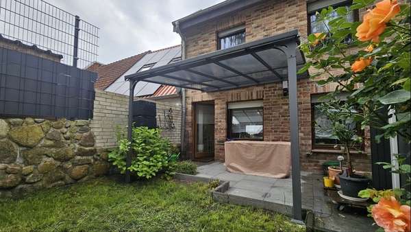 Terrasse - Reihenmittelhaus in 18507 Grimmen mit 65m² kaufen