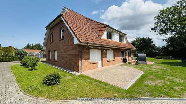 Hausansicht Hausansicht - Dachgeschosswohnung in 18569 Ummanz mit 51m² kaufen