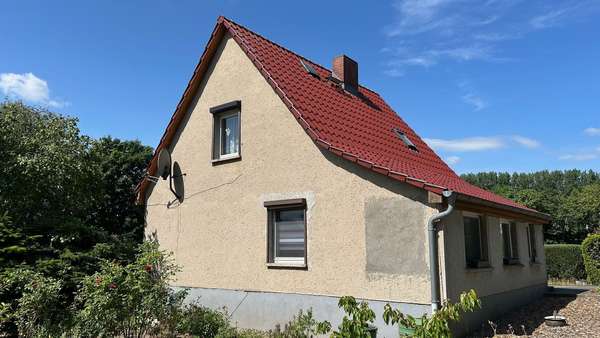 Außenansicht Giebelseite Außenansicht Giebelseite - Einfamilienhaus in 17389 Anklam mit 80m² kaufen