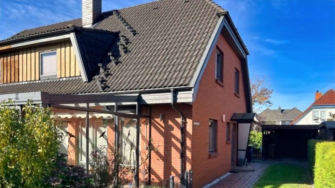 Außenansicht Außenansicht - Doppelhaushälfte in 18442 Steinhagen mit 100m² kaufen