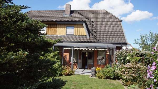 Außenansicht Außenansicht - Doppelhaushälfte in 18442 Steinhagen mit 100m² kaufen