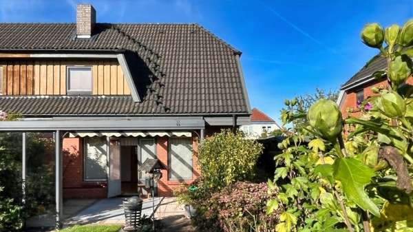 gartenseitige Ansicht gartenseitige Ansicht - Doppelhaushälfte in 18442 Steinhagen mit 100m² kaufen