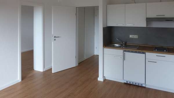 Wohnbereich-Küche-Flur - Etagenwohnung in 17489 Greifswald mit 31m² kaufen