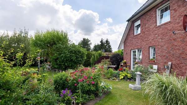 Giebelseite mit Garten - Einfamilienhaus in 18519 Sundhagen mit 133m² kaufen