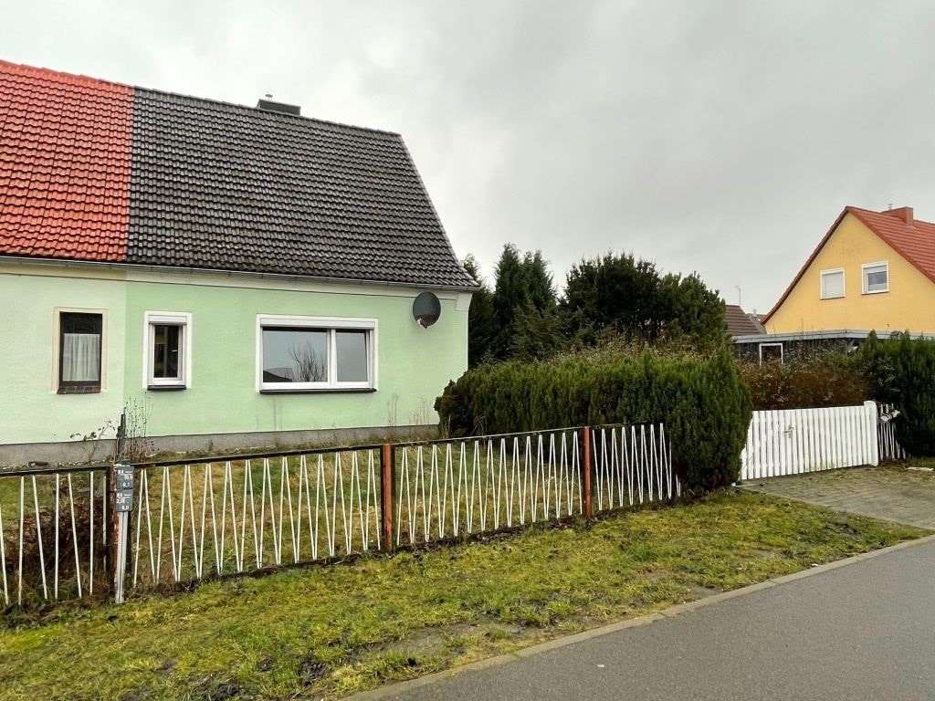 Hausansicht - Doppelhaushälfte in 18507 Grimmen mit 95m² kaufen