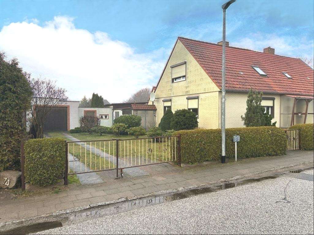 Ansicht Garageneinfahrt - Doppelhaushälfte in 18311 Ribnitz-Damgarten mit 110m² kaufen