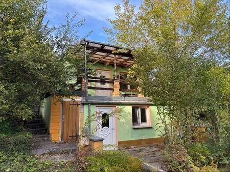 Frontansicht mit Eingang und Terrasse - Ferienhaus in 17094 Groß Nemerow mit 40m² kaufen
