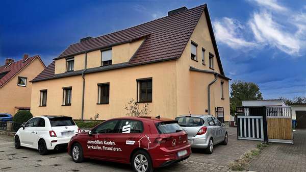 Vorderansicht - Doppelhaushälfte in 14712 Rathenow mit 112m² kaufen