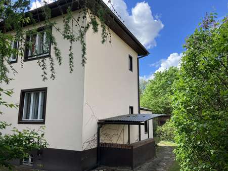 Seitenansicht - Einfamilienhaus in 14612 Falkensee mit 100m² kaufen