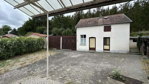 Blick auf das Nebengelass  - Einfamilienhaus in 14558 Nuthetal mit 130m² kaufen