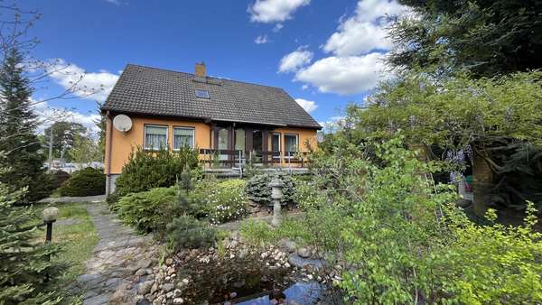 Gartenansicht - Einfamilienhaus in 15711 Königs Wusterhausen mit 153m² kaufen