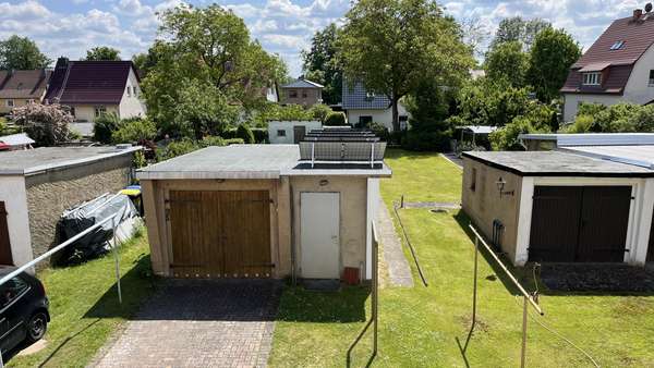 Blick in den Garten Blick in den Garten - Reihenendhaus in 15907 Lübben mit 67m² kaufen