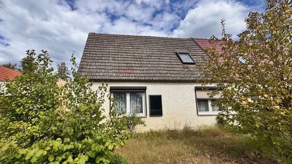 Hausansicht Hausansicht - Doppelhaushälfte in 16767 Leegebruch mit 83m² kaufen