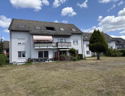 Hausansicht aus dem Garten Hausansicht aus dem Garten - Etagenwohnung in 12529 Schönefeld mit 74m² kaufen