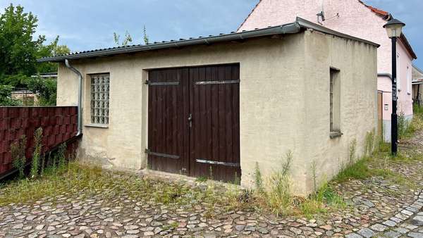 Garage in der Straße - Reihenmittelhaus in 14823 Niemegk mit 104m² kaufen