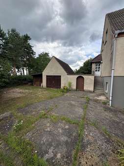 Haus_seitlich_links_Garage Haus_seitlich_links_Garage - Einfamilienhaus in 16945 Meyenburg mit 101m² kaufen
