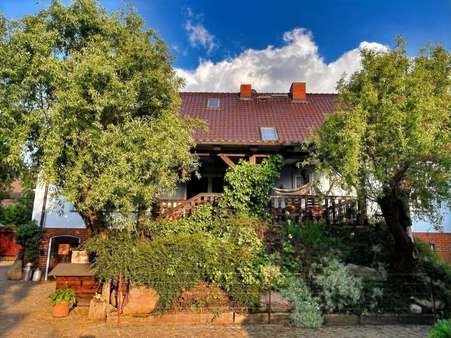 Rückansicht mit Terrasse - Zweifamilienhaus in 16833 Tarmow mit 350m² kaufen