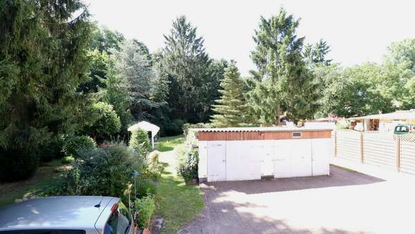 Blick in den Garten - Mehrfamilienhaus in 15537 Erkner mit 250m² kaufen