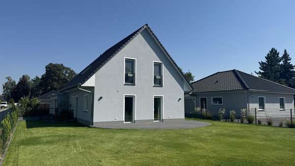 Ansicht West - Einfamilienhaus in 03051 Cottbus mit 121m² kaufen